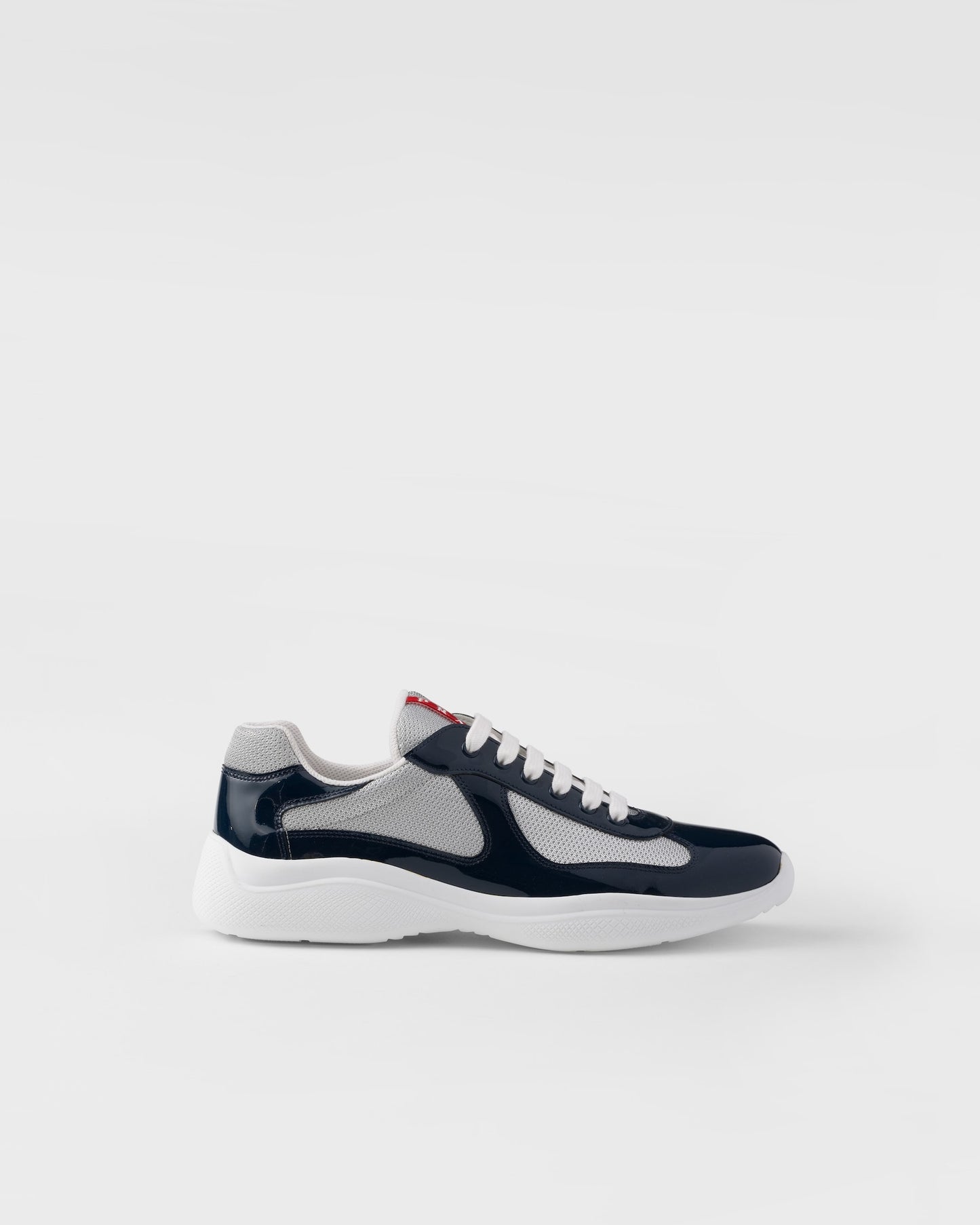 Sneakers Prada America's Cup en cuir verni et tissu technique